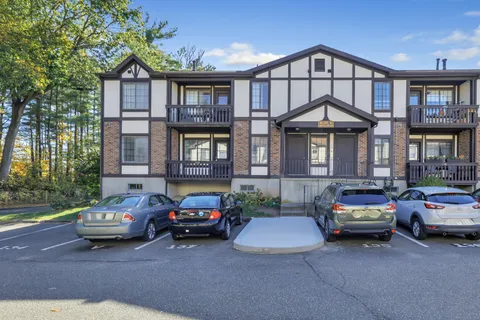 a car parked in front of a house