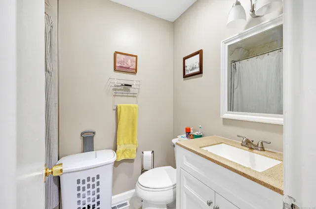 a view of a balcony with wooden floor