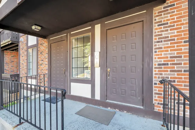 a view of a balcony with wooden floor