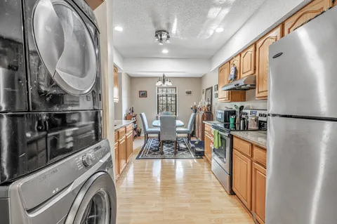 a view of a kitchen with furniture and a kitchen