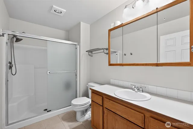 a view of a hallway with windows