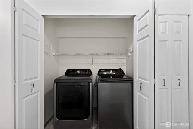 a view of a livingroom with an empty space and a fireplace