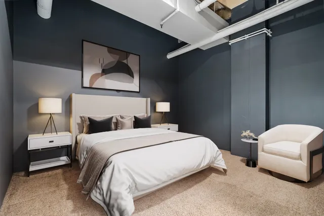 a kitchen with a sink and a refrigerator