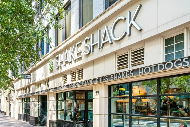 front view of a building with a bench