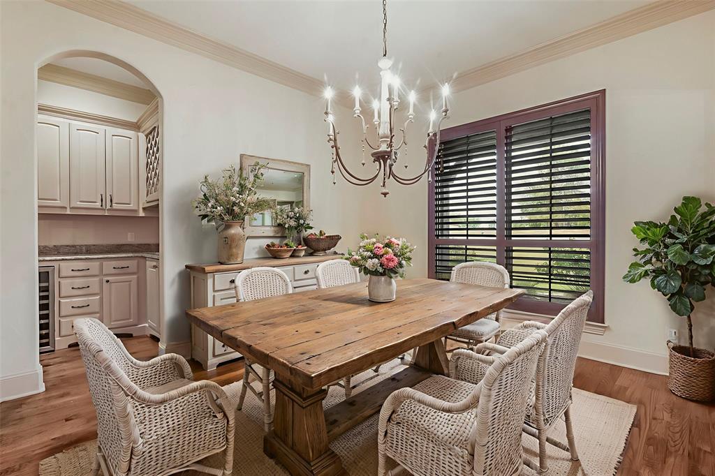 301 Harrison Circle Van Alstyne, TX 75495 - Photo 11 of 38 a view of a dining room with furniture and wooden floor