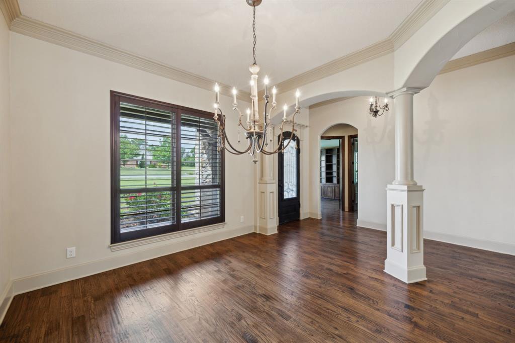 301 Harrison Circle Van Alstyne, TX 75495 - Photo 12 of 38 a view of a room with wooden floor chandelier and windows