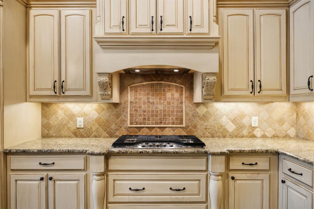 301 Harrison Circle Van Alstyne, TX 75495 - Photo 16 of 38 a stove top oven sitting inside of a kitchen