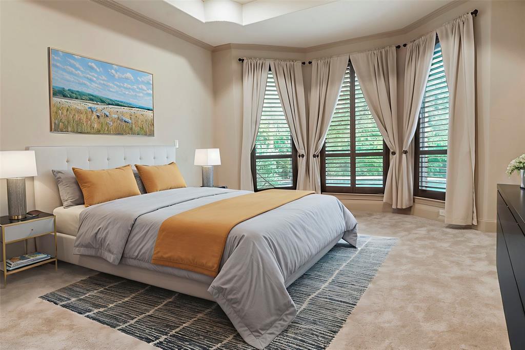 301 Harrison Circle Van Alstyne, TX 75495 - Photo 19 of 38 a bedroom with a large bed and a large window