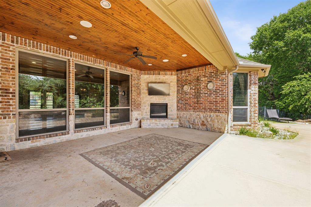 301 Harrison Circle Van Alstyne, TX 75495 - Photo 36 of 38 a view of a house with porch and wooden floor