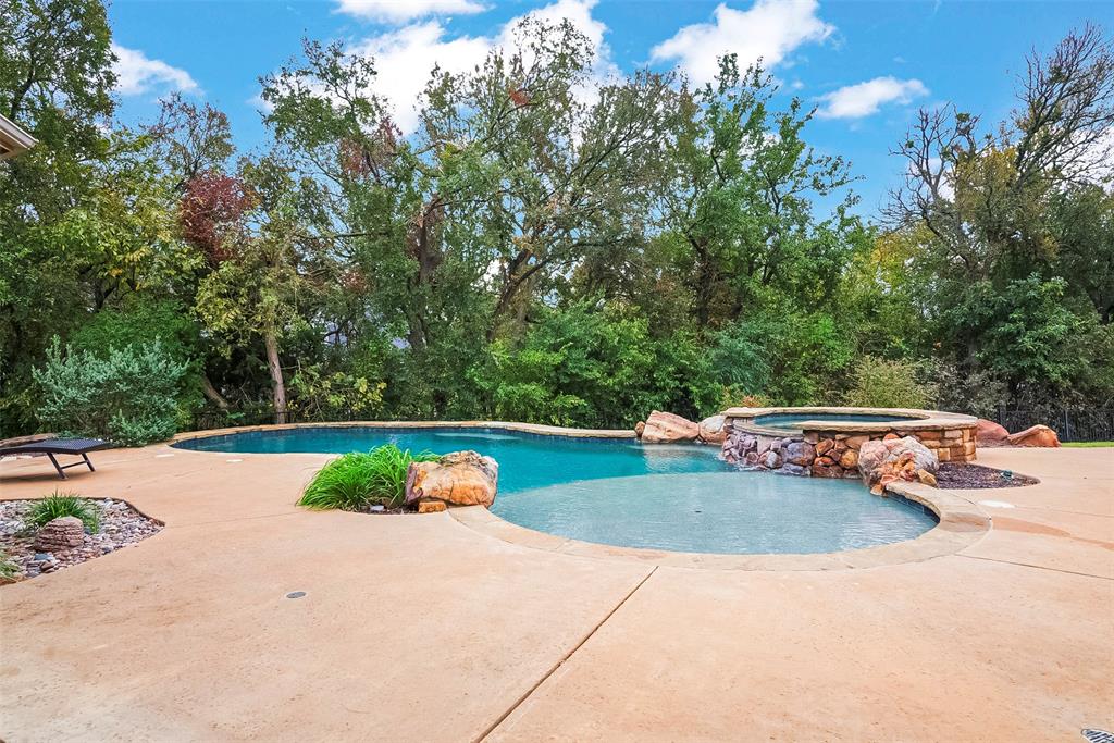 301 Harrison Circle Van Alstyne, TX 75495 - Photo 38 of 38 a view of a swimming pool with a yard