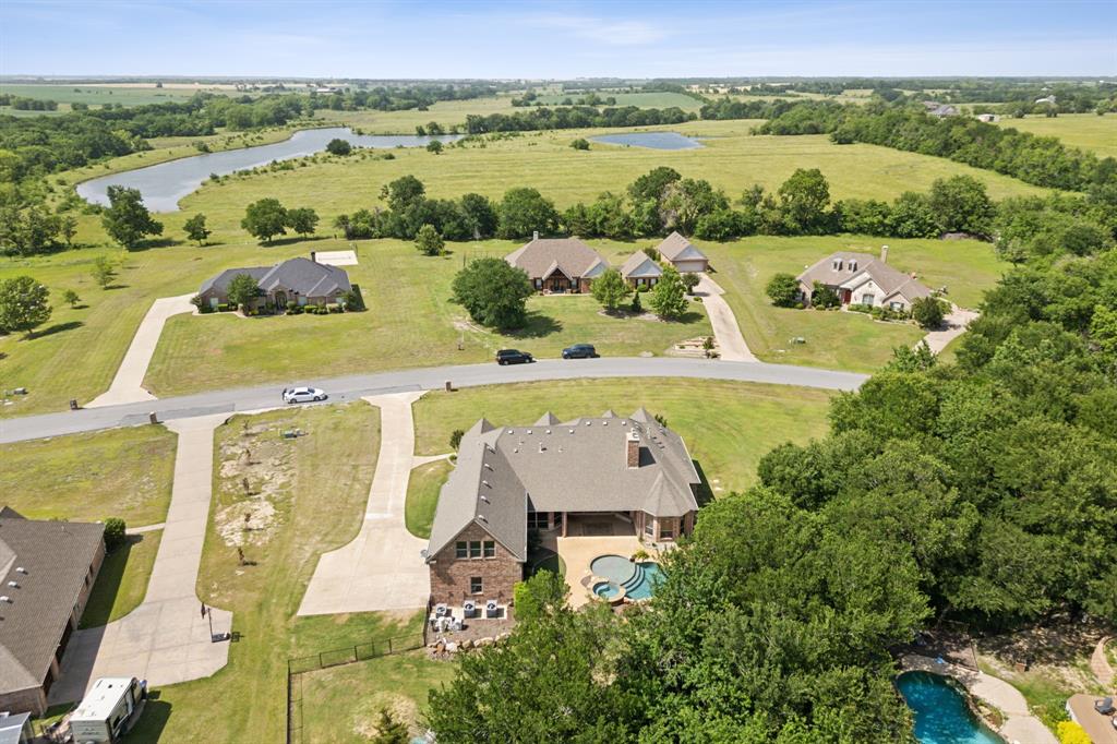 301 Harrison Circle Van Alstyne, TX 75495 - Photo 5 of 38 an aerial view of a house with a outdoor space