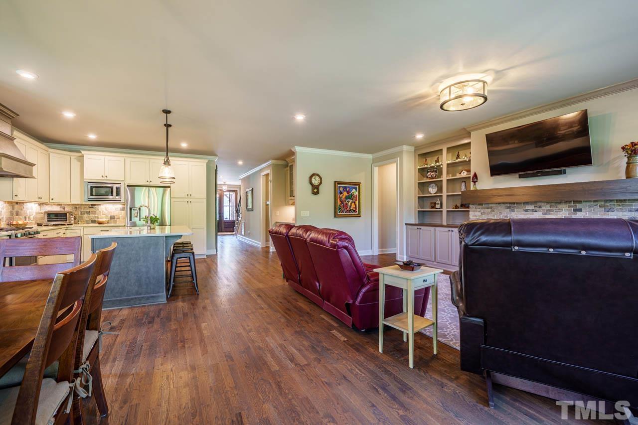 394 Cliffdale Road Chapel Hill, NC 27516 - Photo 21 of 66 a living room with furniture and a flat screen tv