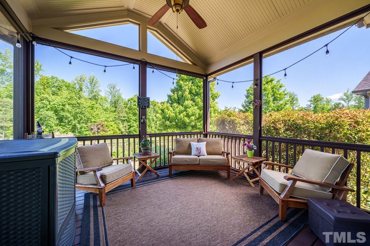 394 Cliffdale Road Chapel Hill, NC 27516 - Photo 45 of 66 a balcony with furniture and a potted plant