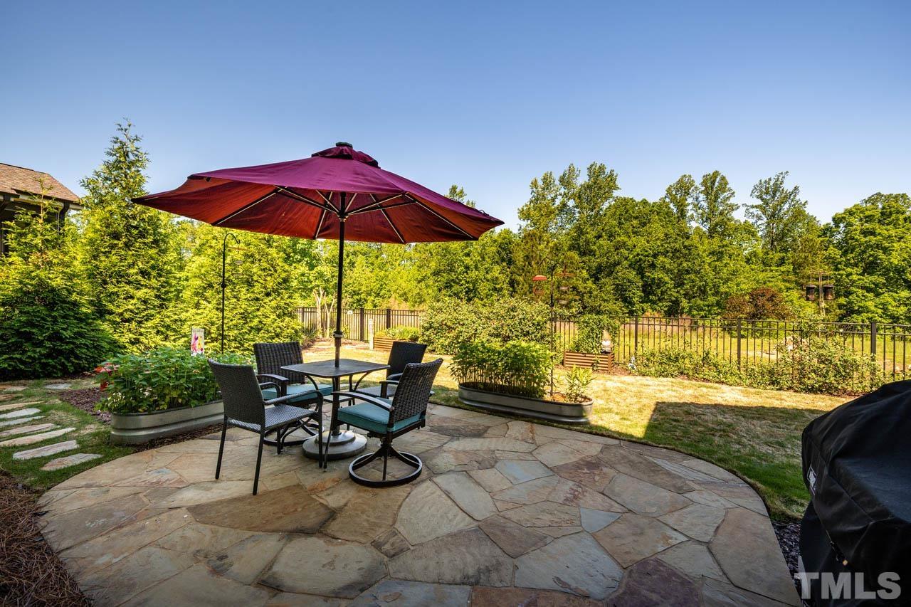 394 Cliffdale Road Chapel Hill, NC 27516 - Photo 50 of 66 a view of a yard with furniture and a yard