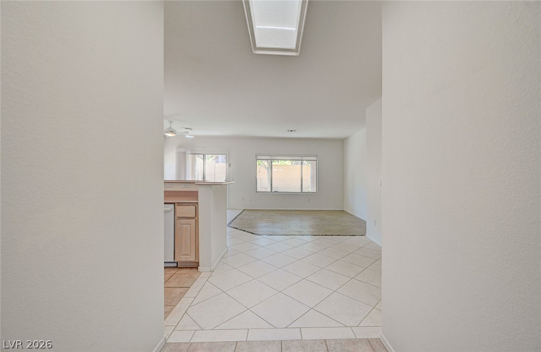 2529 Springville Way Henderson, NV 89052 - Photo 66 of 70 An open floor plan flows seamlessly from tiled transitions into the main living spaces.