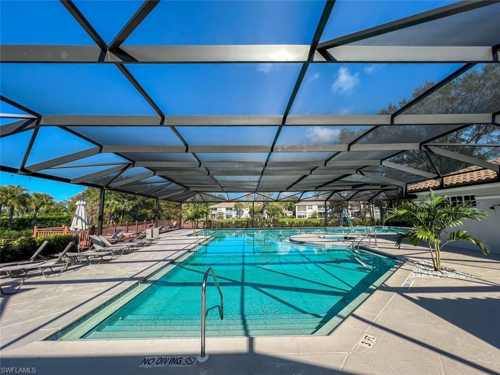 6816 Satinleaf Road South, Unit 102 Naples, FL 34109 - Photo 26 of 35 a view of a indoor swimming pool