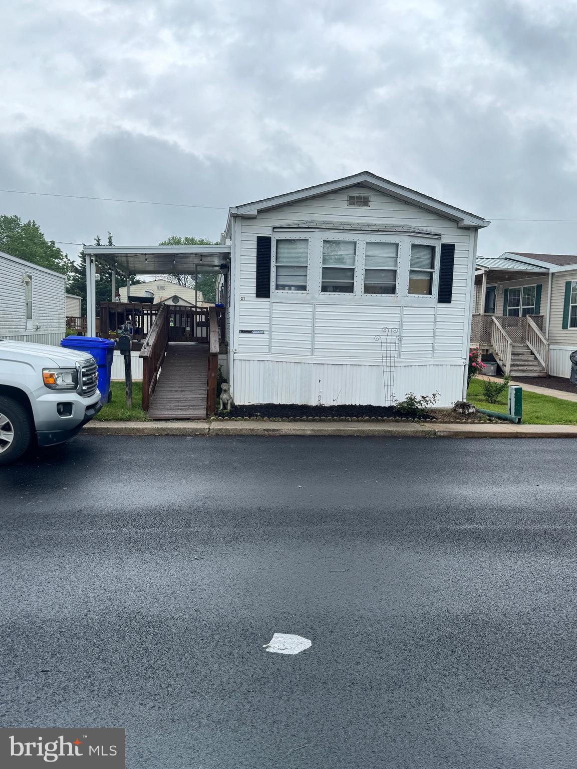 a view of multiple houses with yard