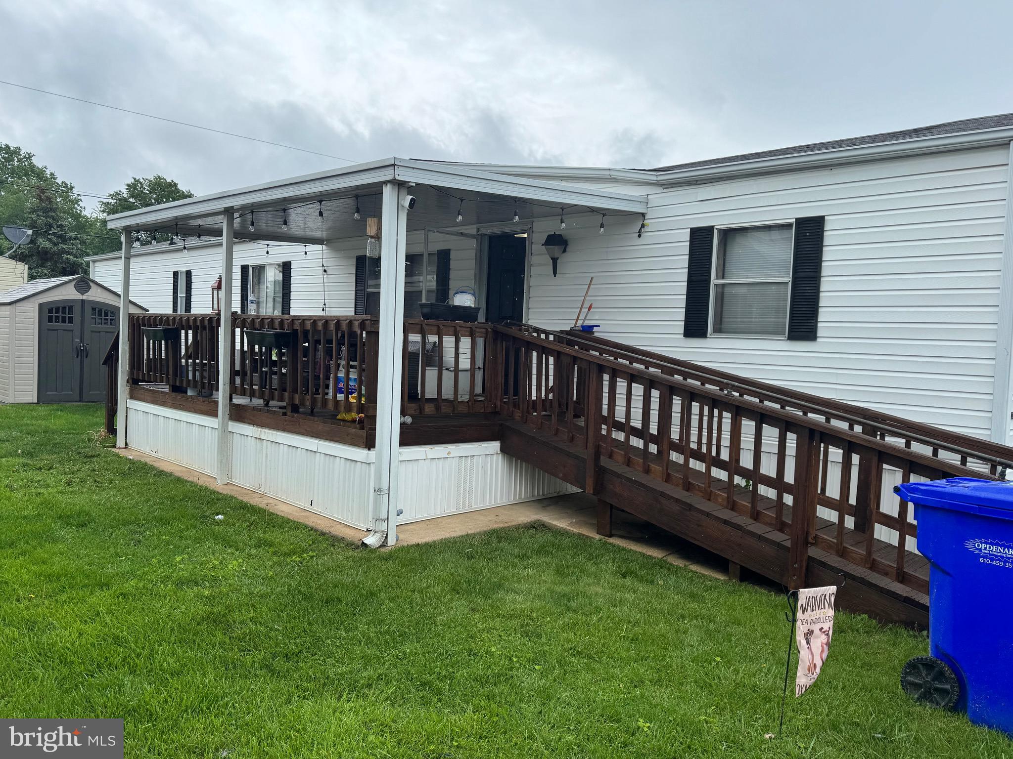 31 North Ellis Road, Unit A031 Wilmington, DE 19810 - Photo 2 of 9 a view of a house with a yard and deck