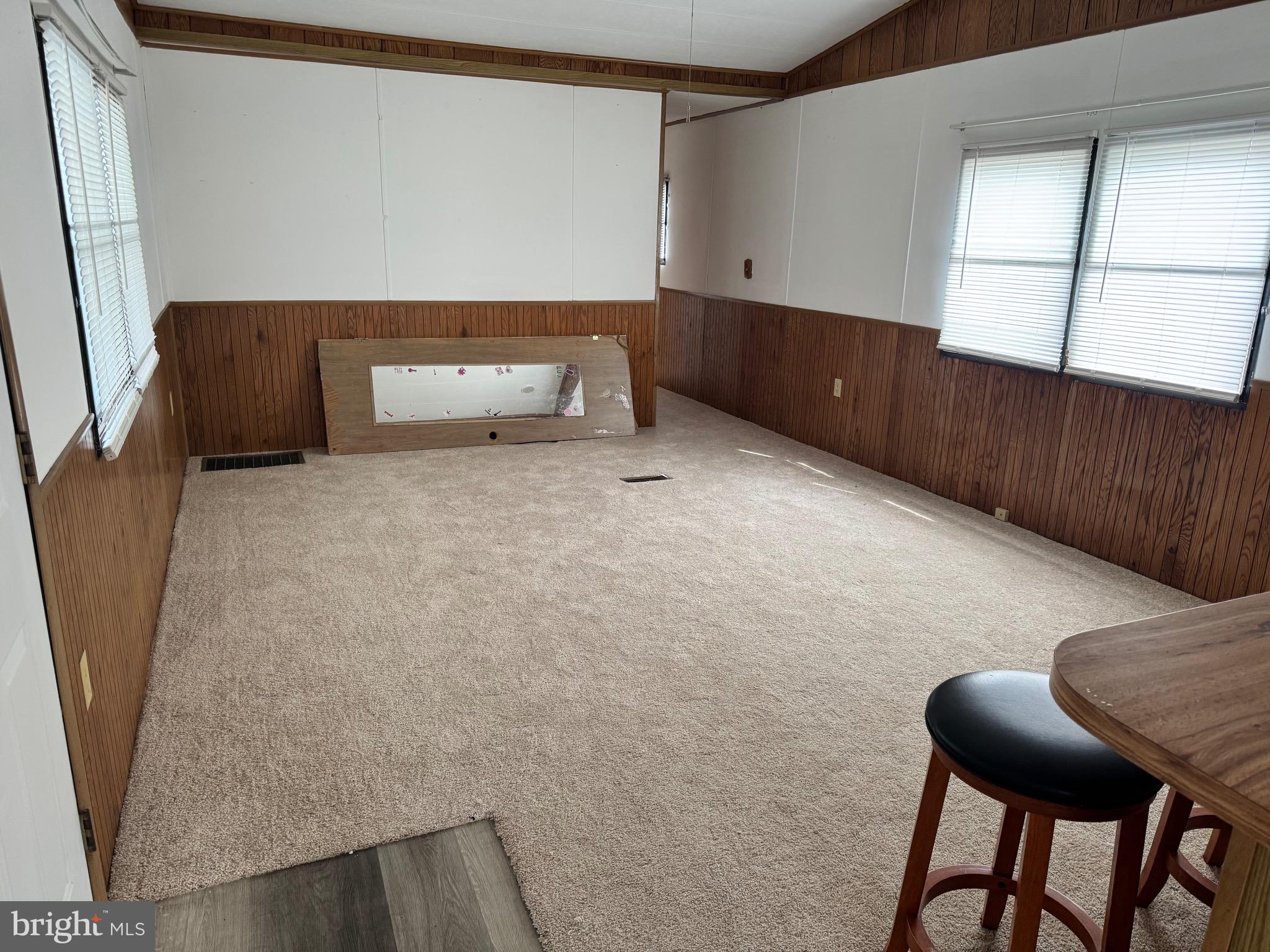 31 North Ellis Road, Unit A031 Wilmington, DE 19810 - Photo 4 of 9 a room with a table and chairs