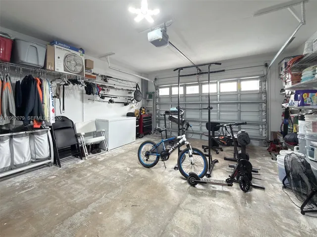 a storage room with washer and dryer