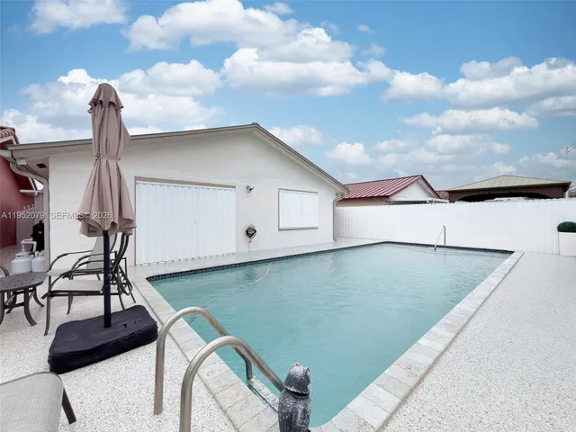 a house view with a garden space