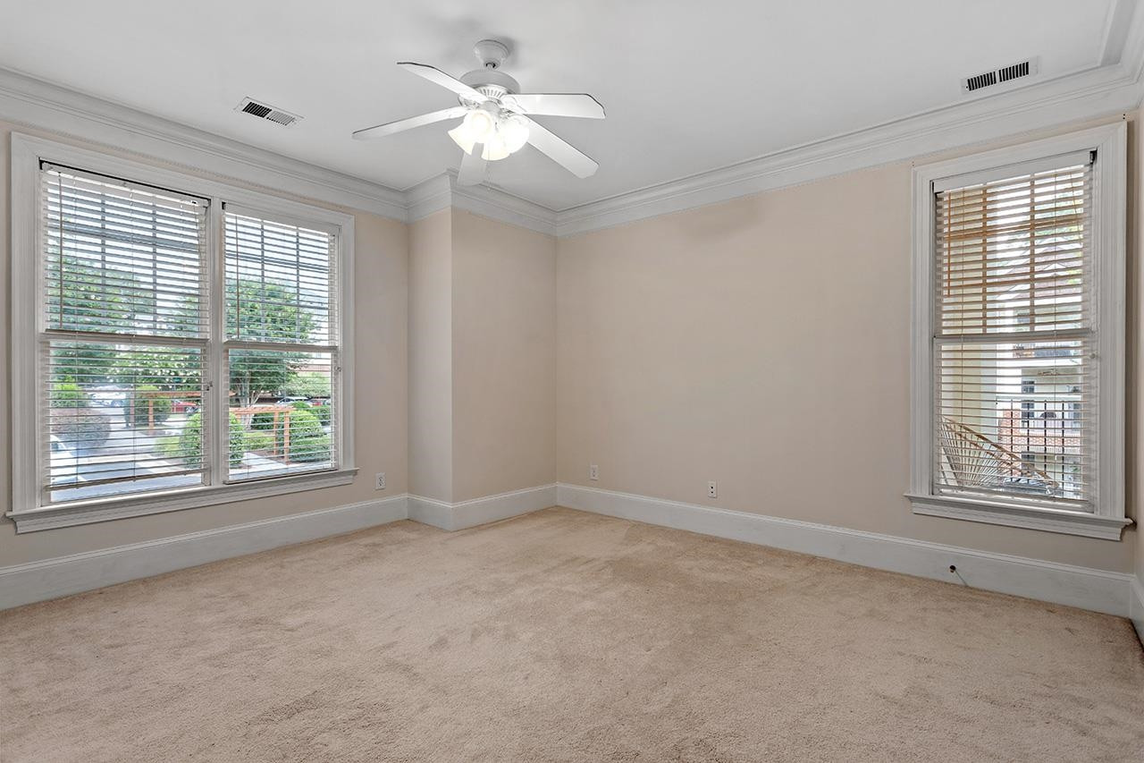 900 Canenaugh Drive, Unit 201 Raleigh, NC 27604 - Photo 15 of 28 a view of an empty room with a window