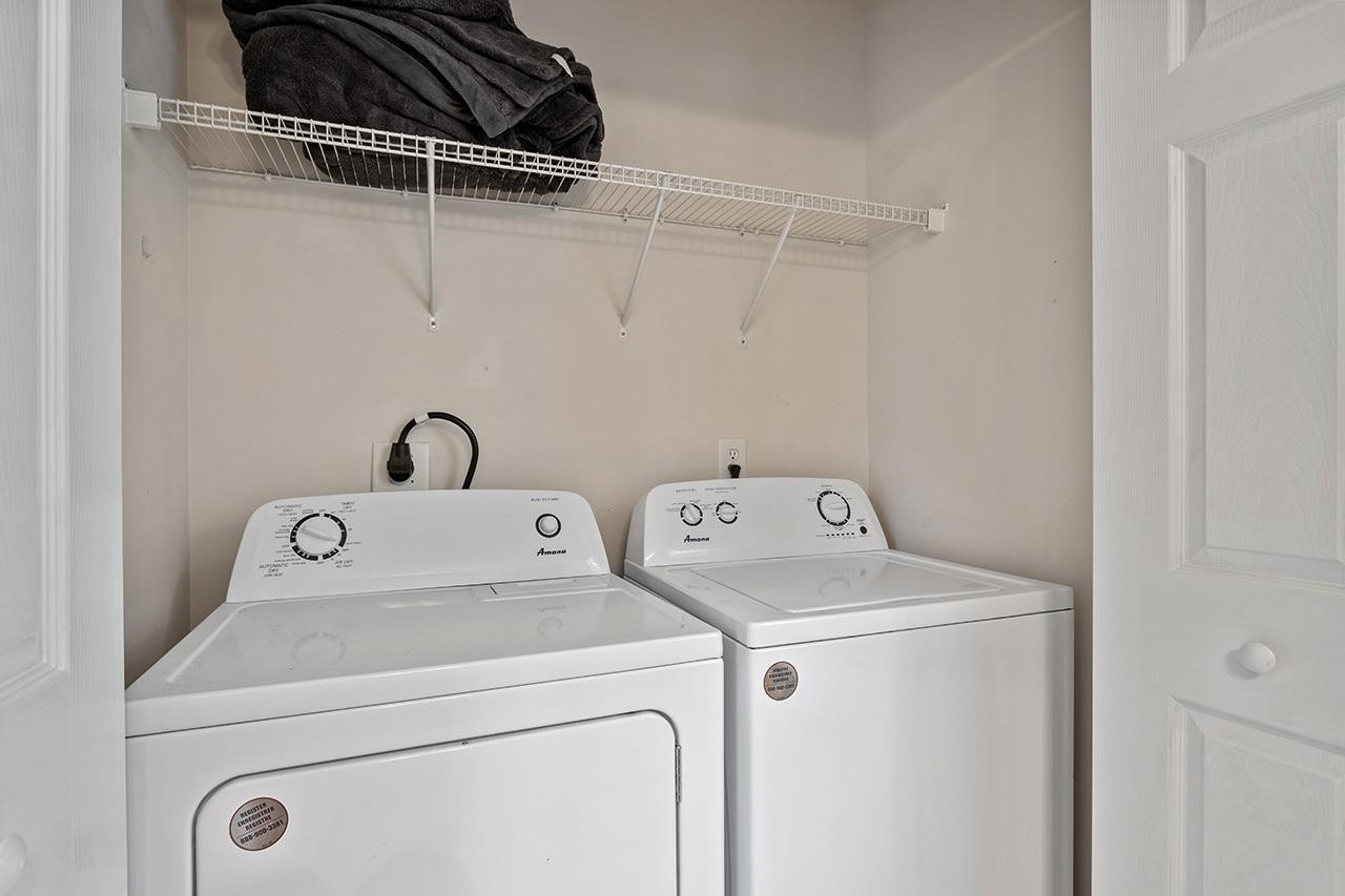 900 Canenaugh Drive, Unit 201 Raleigh, NC 27604 - Photo 17 of 28 a utility room with dryer and washer