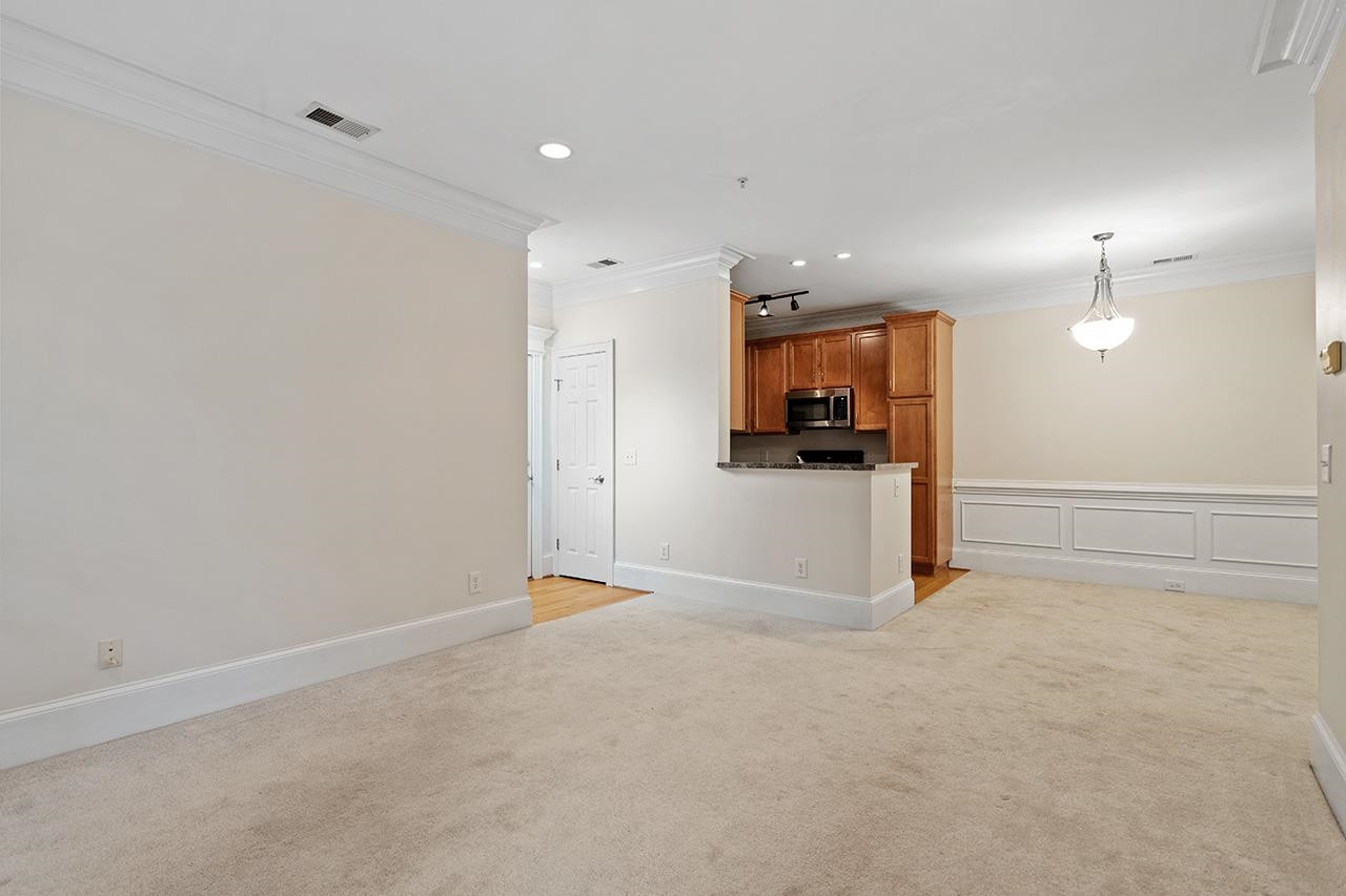 900 Canenaugh Drive, Unit 201 Raleigh, NC 27604 - Photo 2 of 28 a view of a kitchen with a sink