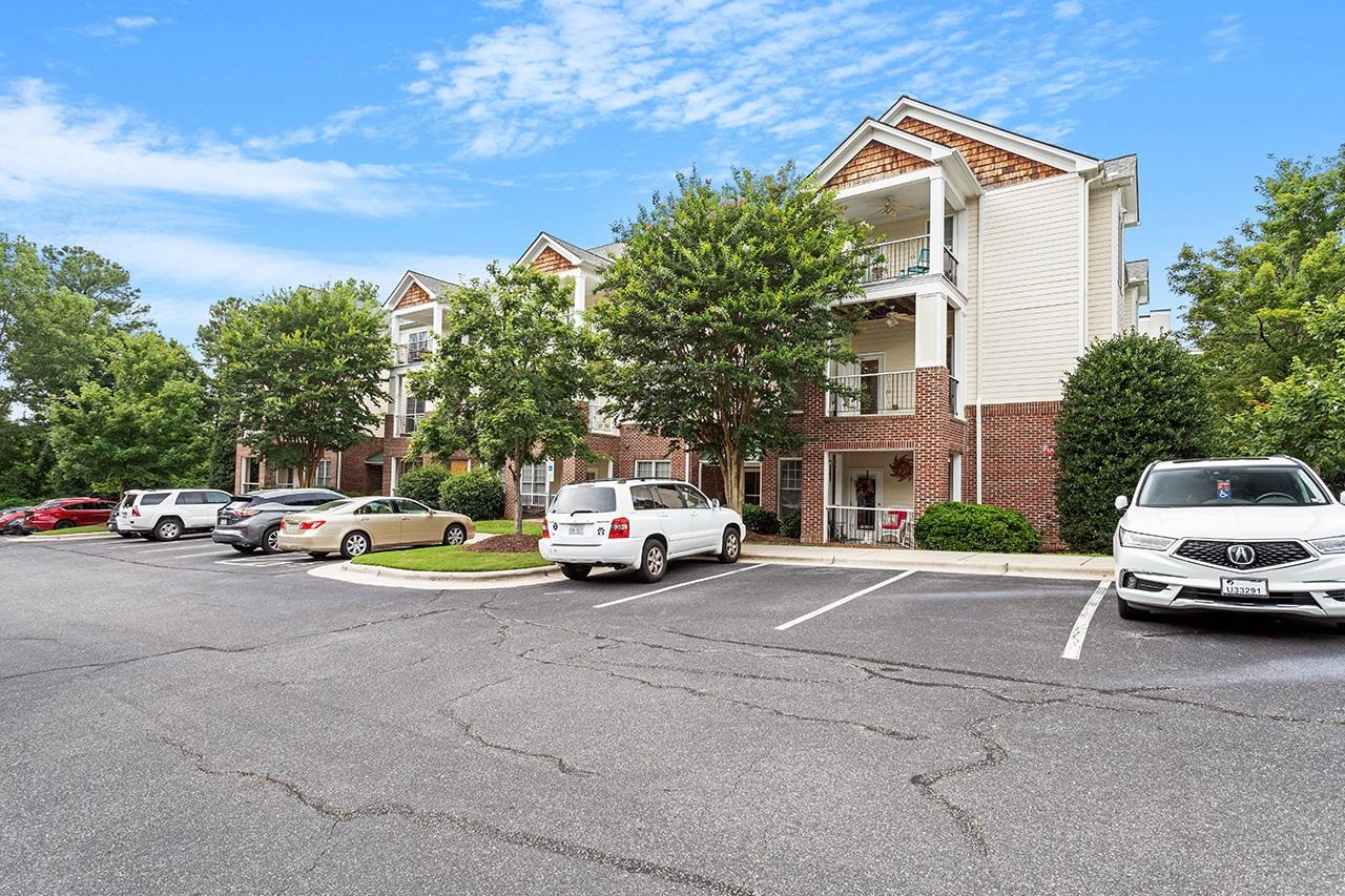 900 Canenaugh Drive, Unit 201 Raleigh, NC 27604 - Photo 24 of 28 a car parked in front of a house