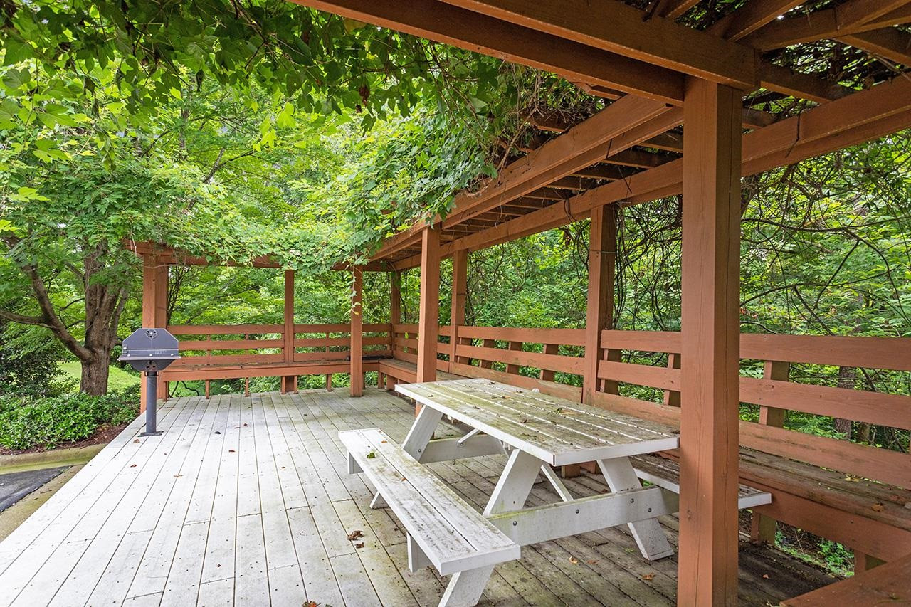 900 Canenaugh Drive, Unit 201 Raleigh, NC 27604 - Photo 25 of 28 a view of porch with seating space