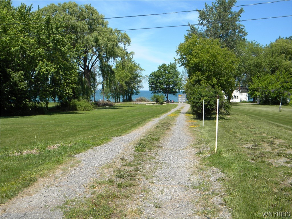 2795 West Lake Road Wilson, NY 14172 - Photo 1 of 1 View of deep lot from the road