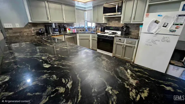 a kitchen with refrigerator and countertop