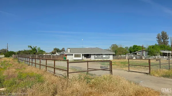 a view of house with outdoor space