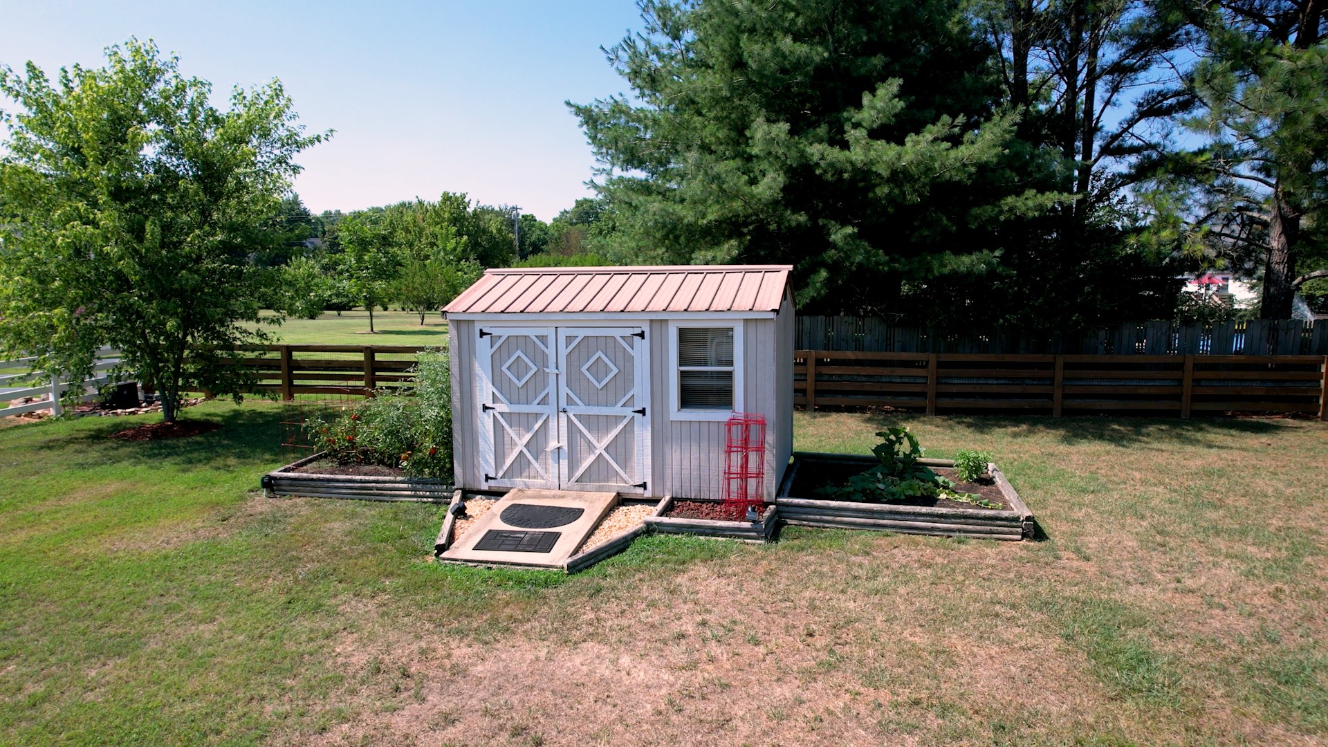 1208 Hunters Point Lane Spring Hill, TN 37174 - Photo 5 of 31 a view of backyard with wooden fence and a large tree