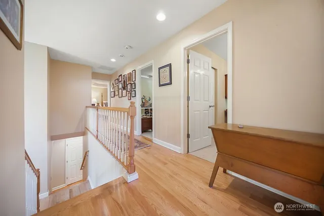 a bed room with a bed and a chandelier
