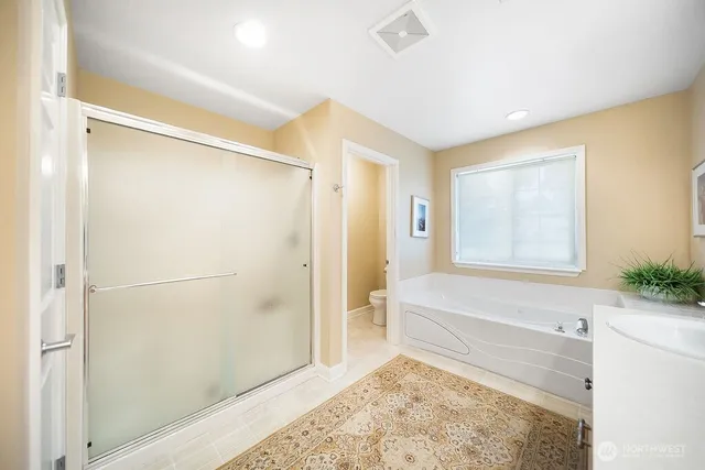 a bed room with a bed and a window