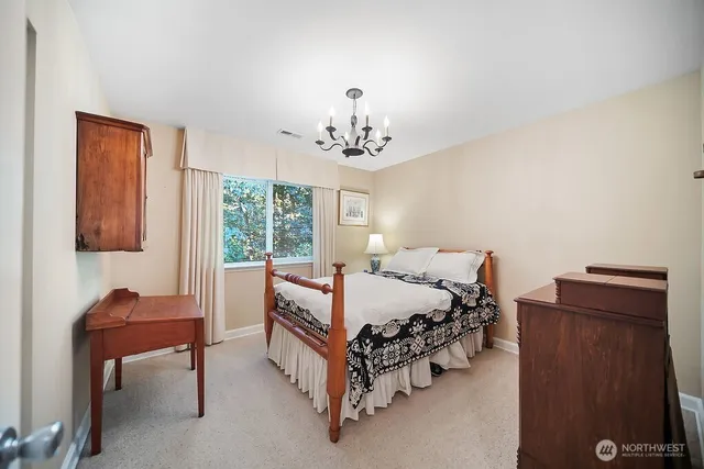 a bathroom with a sink a vanity and a mirror