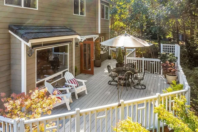 a view of balcony with furniture