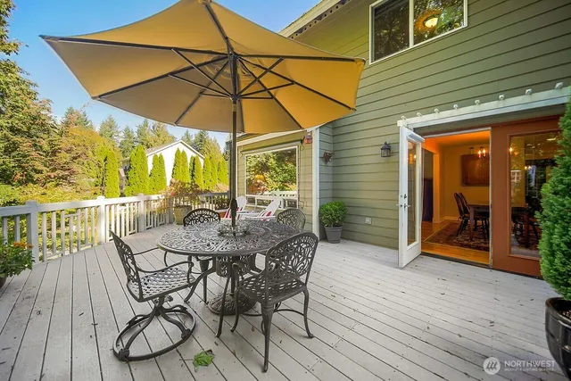 a view of a swimming pool with a lounge chair