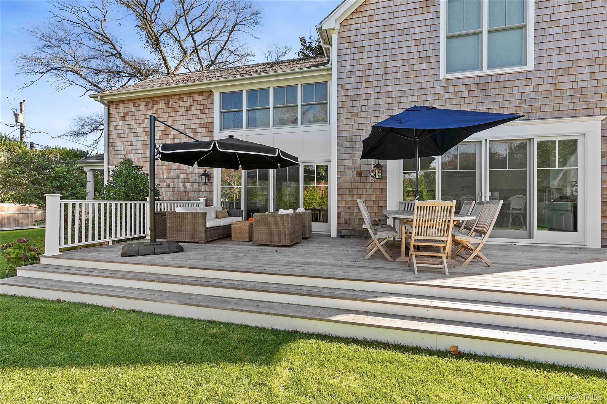 96 Miller Road Southampton, NY 11968 - Photo 10 of 15 a building outdoor space with patio furniture and potted plants