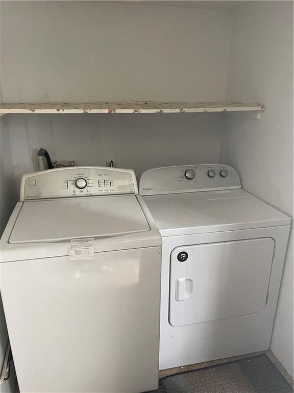 97 A & B United Rd Mount Mount Pleasant, PA 15666 - Photo 7 of 17 a utility room with dryer and washer