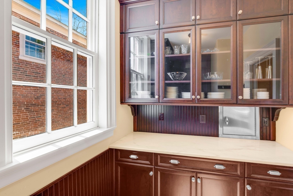 26 Winter Street Salem, MA 01970 - Photo 14 of 42 a kitchen with a window and a sink