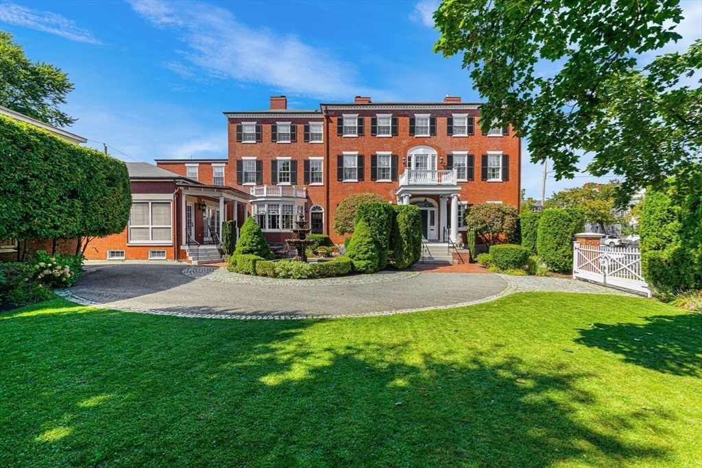 26 Winter Street Salem, MA 01970 - Photo 2 of 42 a front view of a house with a yard