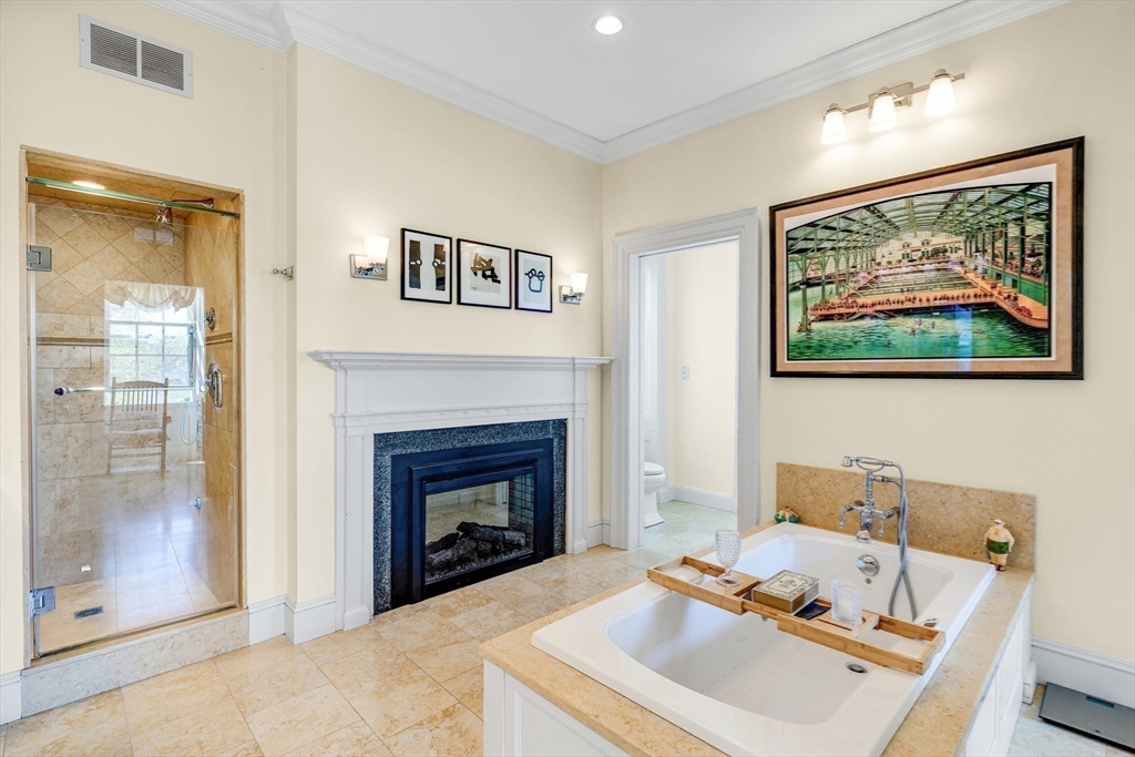 26 Winter Street Salem, MA 01970 - Photo 23 of 42 a living room with furniture and a fireplace