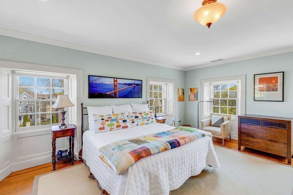 26 Winter Street Salem, MA 01970 - Photo 27 of 42 a bedroom with a bed and a couch