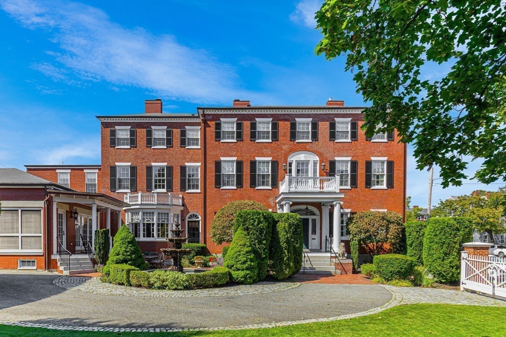 26 Winter Street Salem, MA 01970 - Photo 3 of 42 a front view of residential houses with yard
