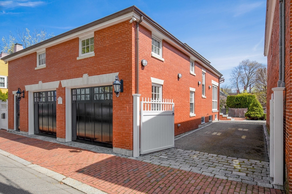 26 Winter Street Salem, MA 01970 - Photo 40 of 42 a view of a house with a yard