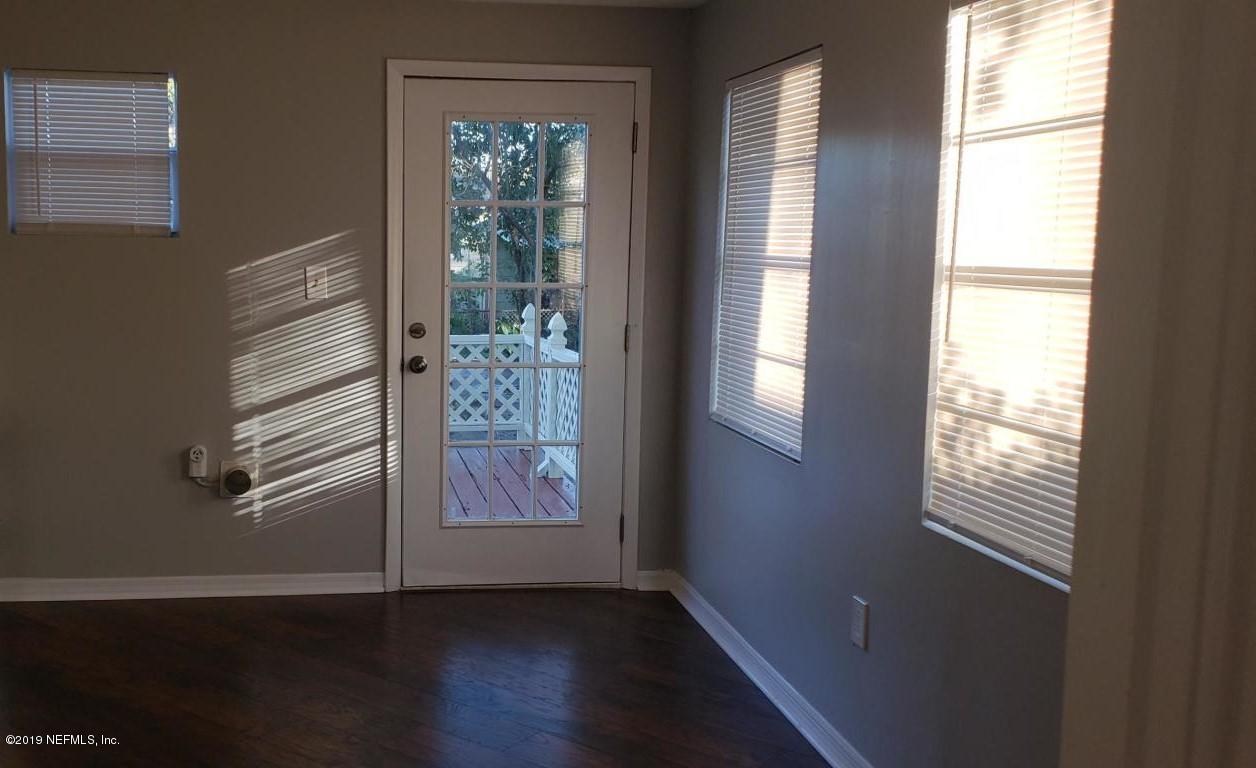 4633 Manchester Road Jacksonville, FL 32210 - Photo 14 of 26 a view of an entryway with wooden floor