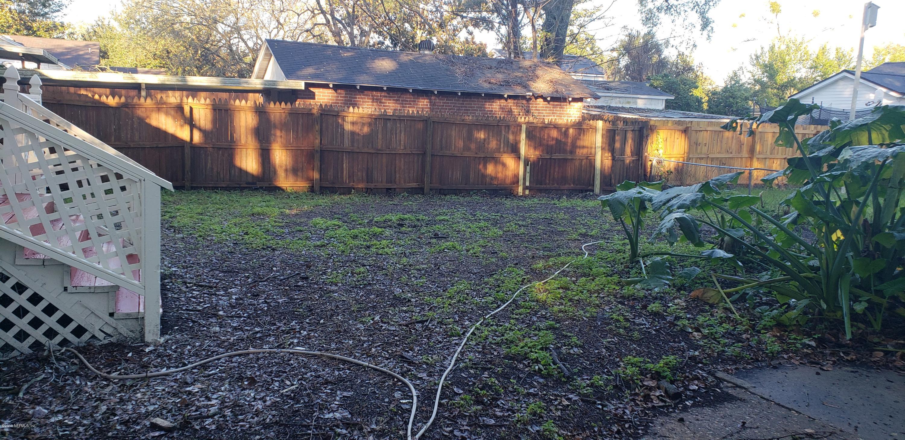 4633 Manchester Road Jacksonville, FL 32210 - Photo 17 of 26 a view of a backyard