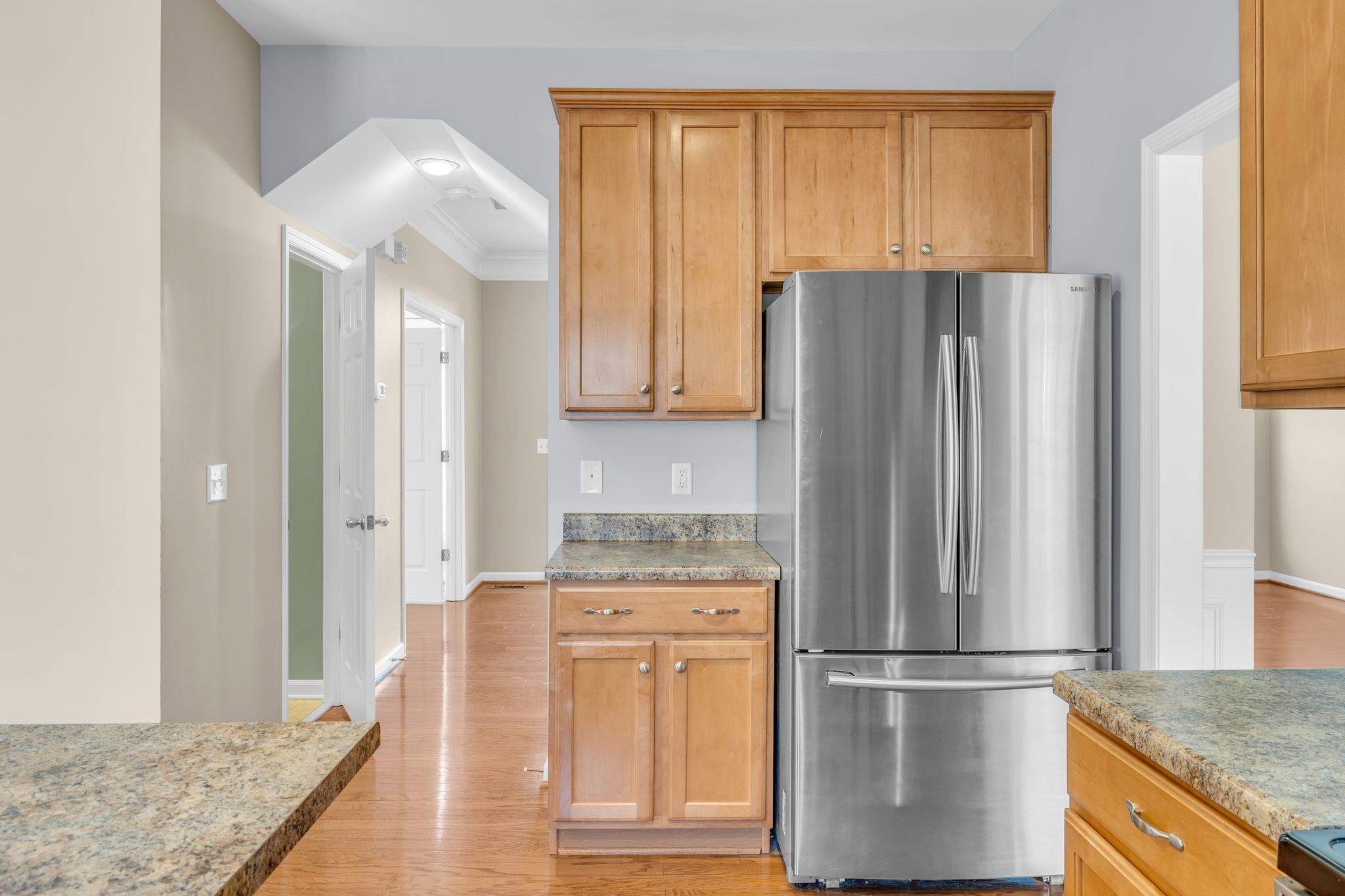 105 Lagan Court Franklin, TN 37064 - Photo 19 of 51 a kitchen with stainless steel appliances granite countertop a refrigerator and a stove